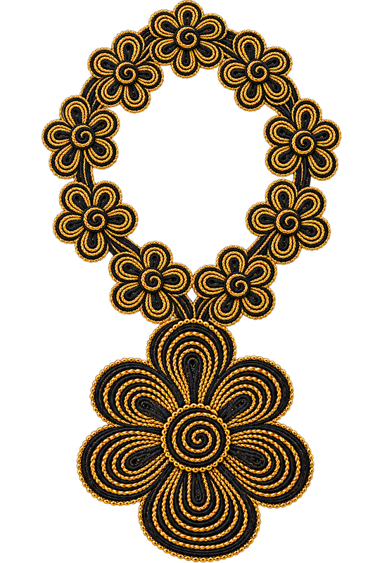 A decorative braided cord ornament or wreath made of black and gold floral motifs, shown isolated on a plain white background.