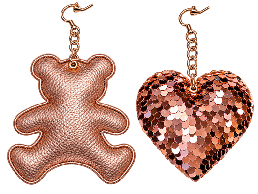 Handmade asymmetric rose gold statement earrings featuring a metallic teddy bear and sparkling sequin heart with rose gold chain details by PAULINA’S FRIENDS.